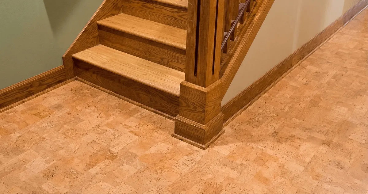 End of a staircase with cork flooring in Wichita, KS
