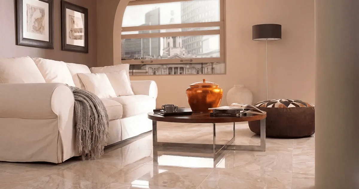 Modern living room with professionally installed marble flooring, a beige sofa, coffee table in Wichita, KS